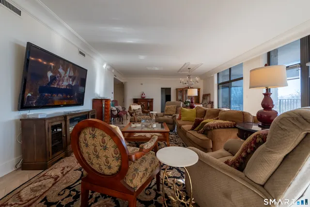 a view of living room with furniture and a window