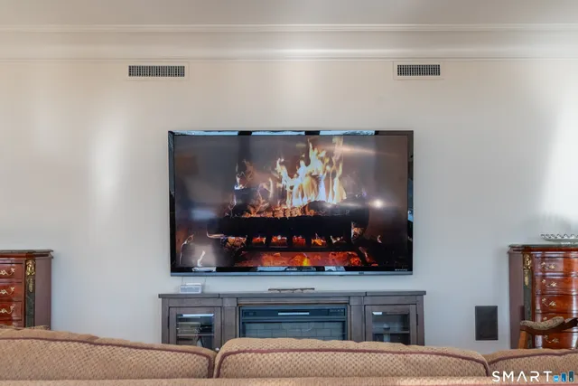 a view of a hallway with dining area