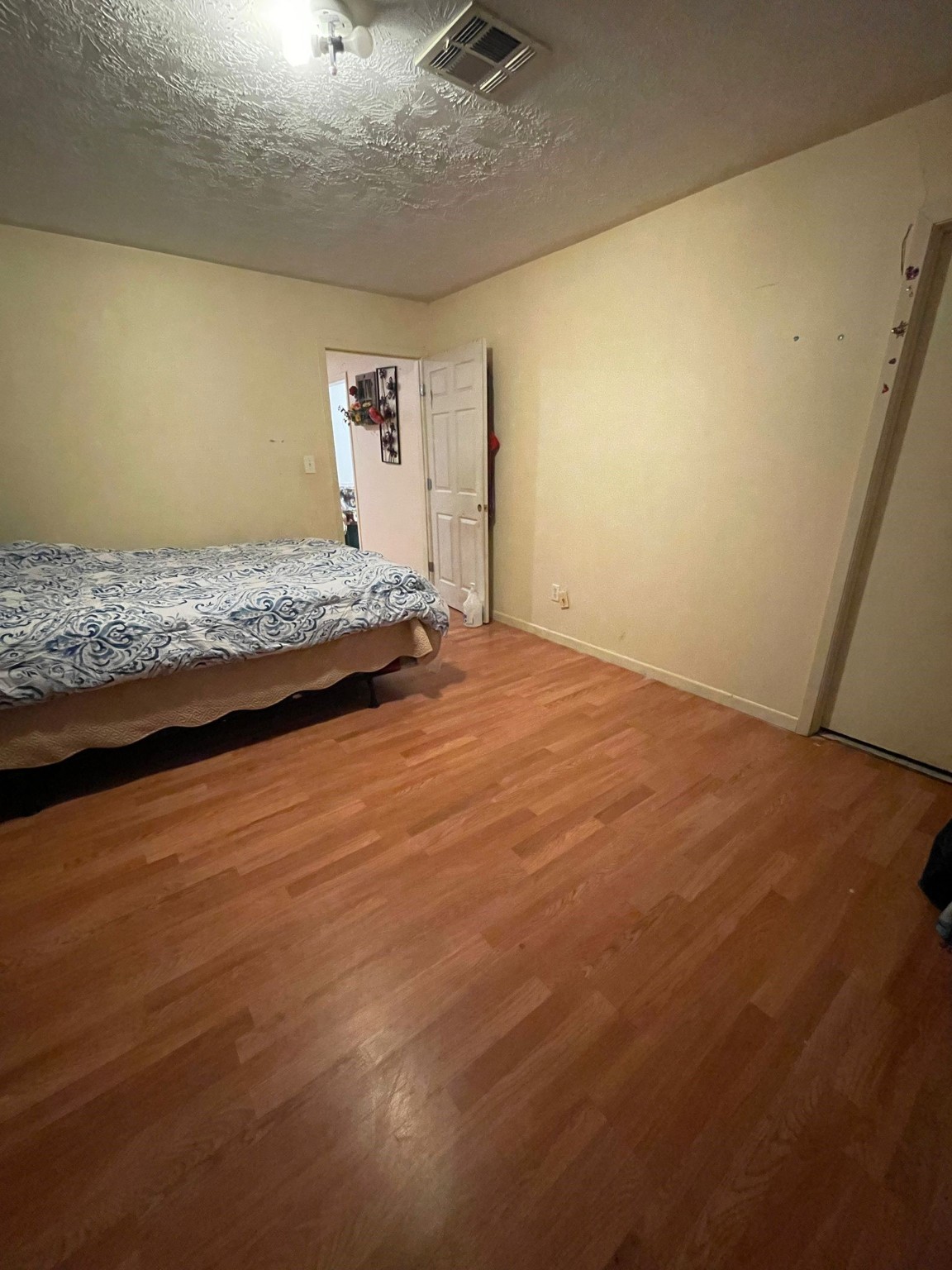 26113 Tyler Park Road Bedias, TX 77831 - Photo 11 of 18 a view of a livingroom with wooden floor