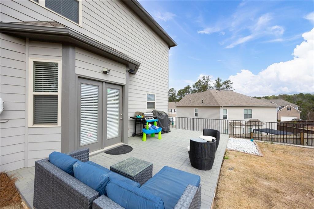 641 Little Bear Loop Canton, GA 30114 - Photo 27 of 37 a view of a terrace with seating space