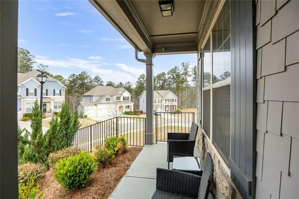 641 Little Bear Loop Canton, GA 30114 - Photo 3 of 37 a view of a porch with furniture