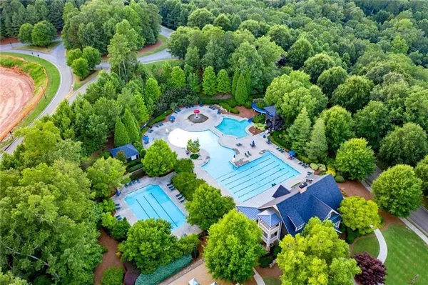 an aerial view of a house with a garden