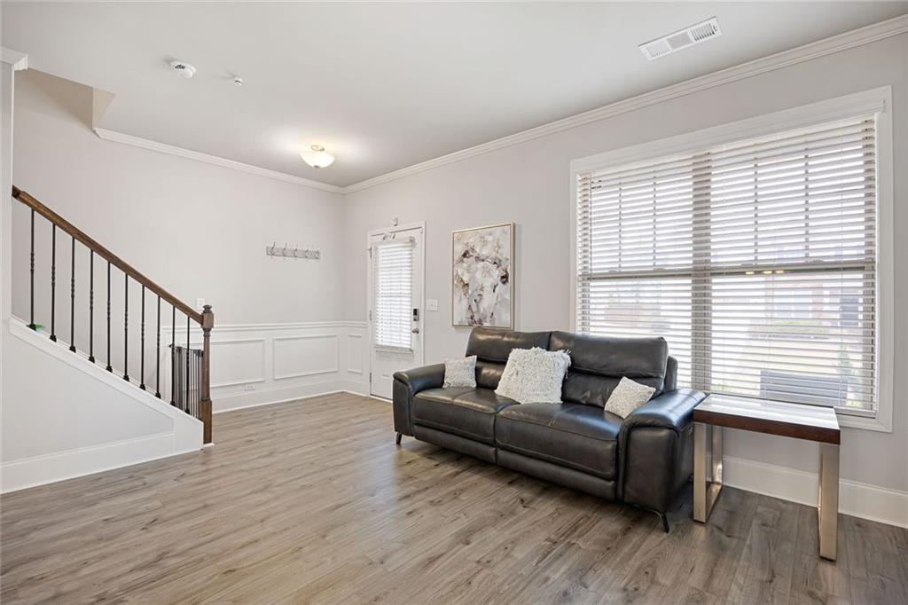 641 Little Bear Loop Canton, GA 30114 - Photo 4 of 37 a living room with furniture and wooden floor