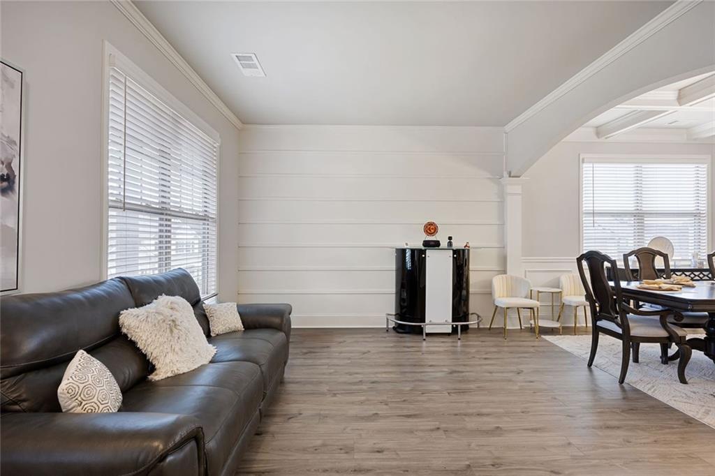 641 Little Bear Loop Canton, GA 30114 - Photo 5 of 37 a view of a livingroom with furniture and windows