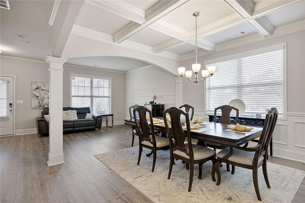 641 Little Bear Loop Canton, GA 30114 - Photo 7 of 37 a view of a dining room with furniture and window