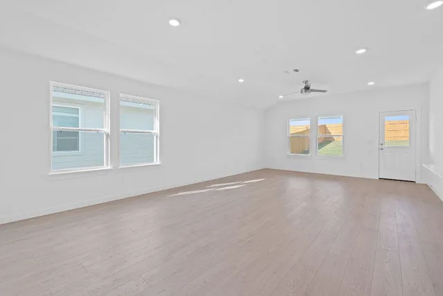 an empty room with windows