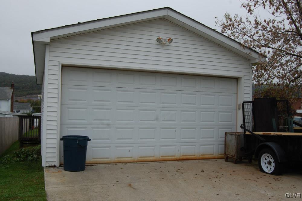 36 East Ruddle Street Coaldale, PA 18218 - Photo 11 of 16 a front view of a house with garage
