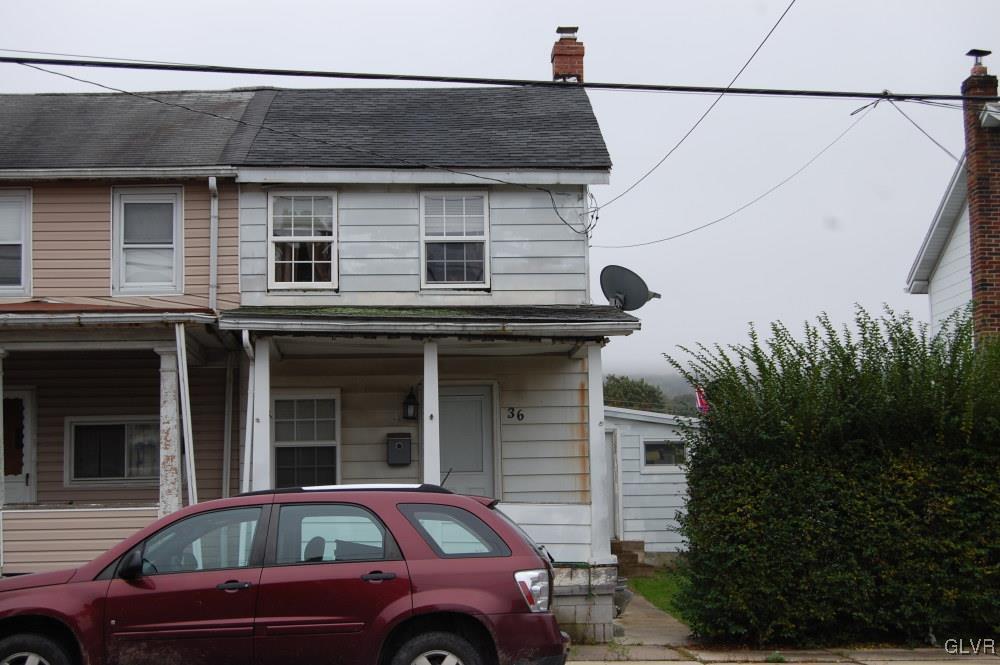 36 East Ruddle Street Coaldale, PA 18218 - Photo 2 of 16 a car parked in front of a house