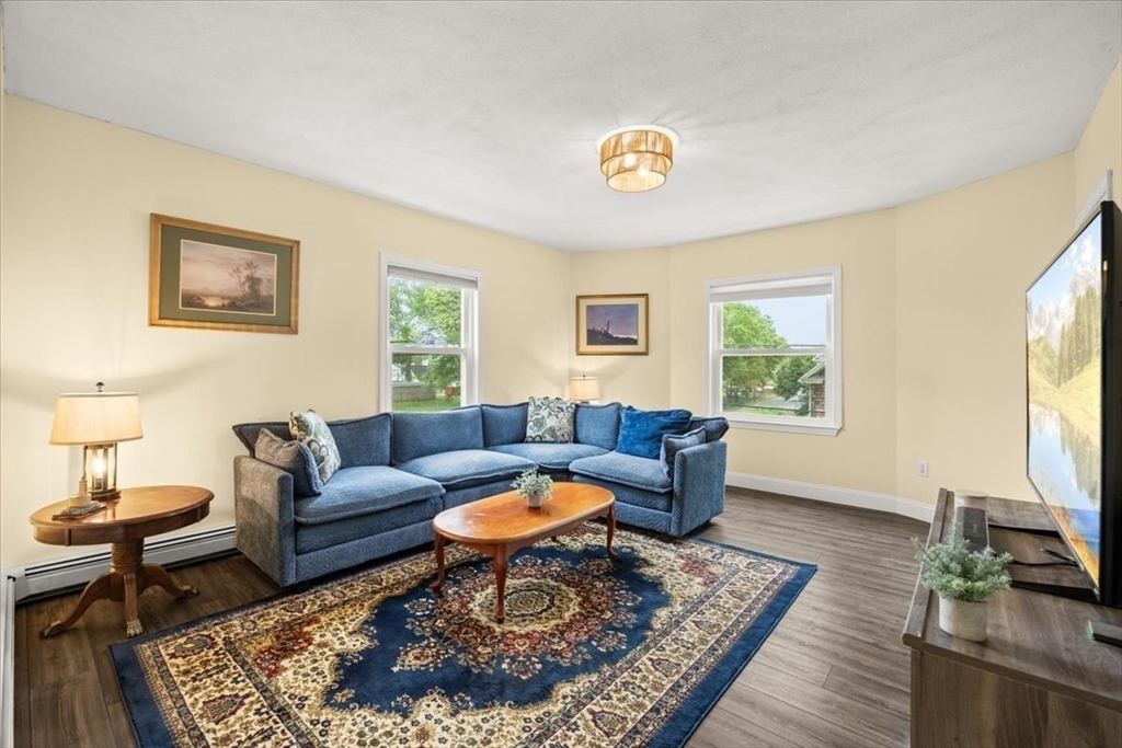 35 Hazel Street, Unit B Attleboro, MA 02703 - Photo 17 of 21 a living room with furniture and a window