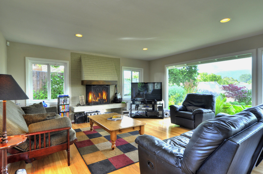 40 Pine Drive Santa Barbara, CA 93105 - Photo 6 of 30 a living room with furniture and a fireplace