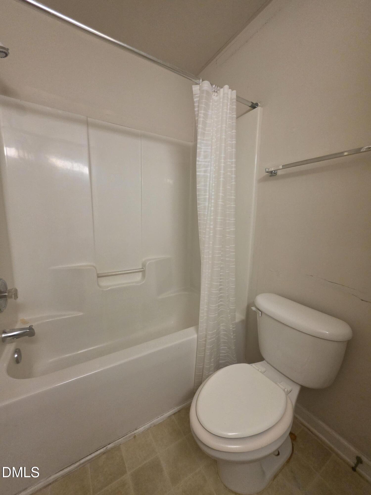 2405 Trout Stream Drive Raleigh, NC 27604 - Photo 13 of 13 a bathroom with a toilet and a shower