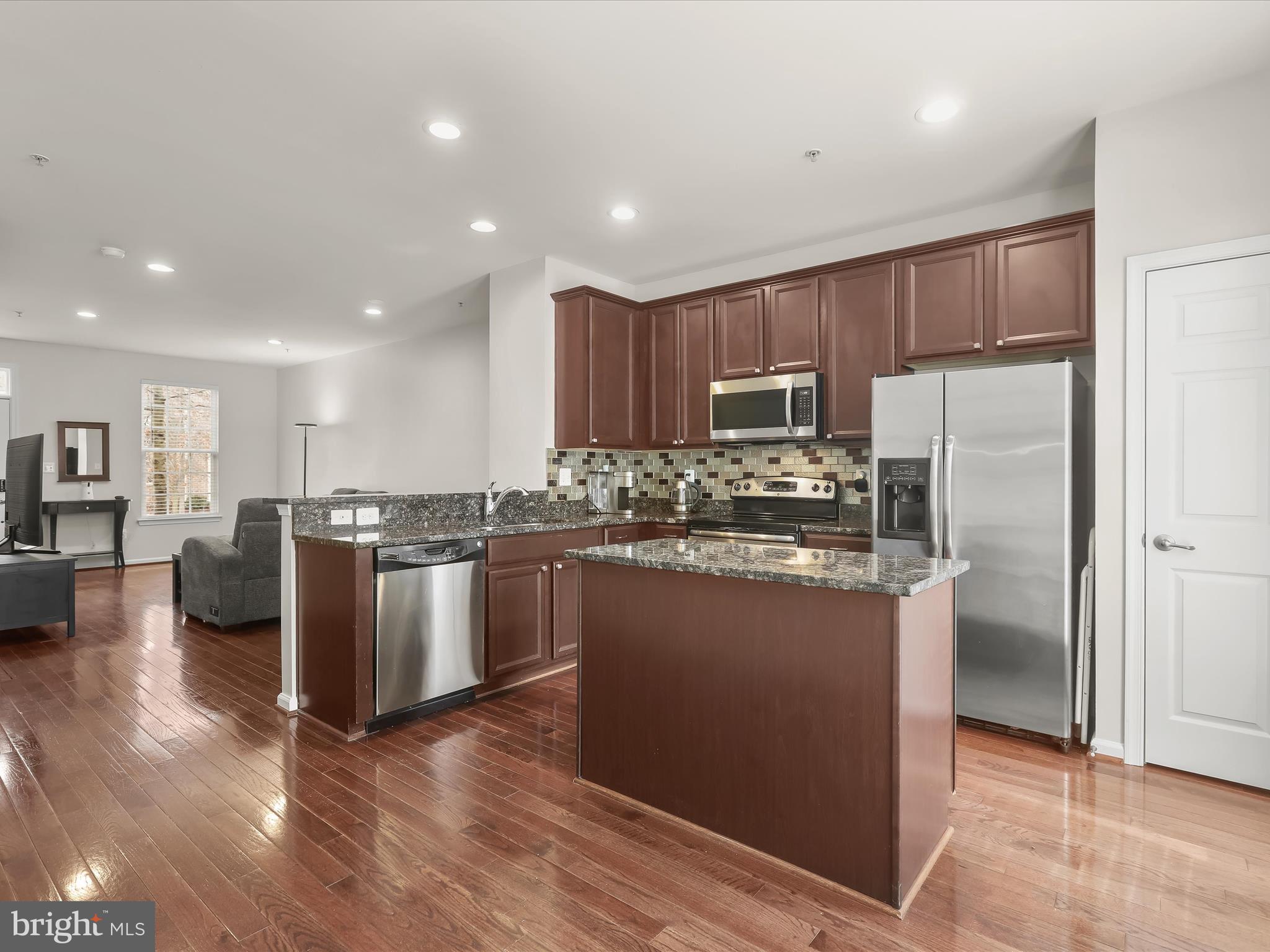7222 Abbey Road Elkridge, MD 21075 - Photo 11 of 35 Hardwood flooring & recessed lighting