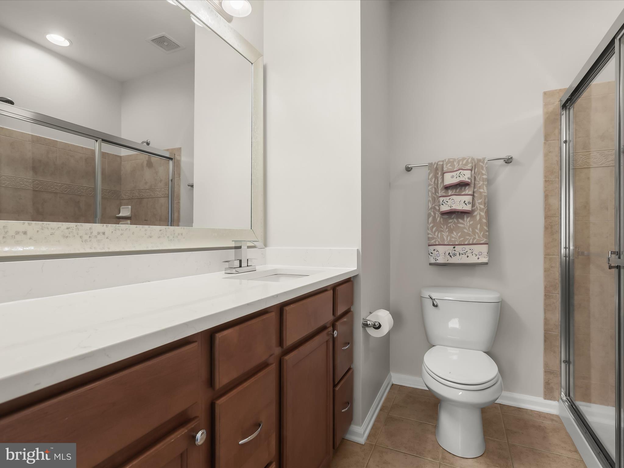 7222 Abbey Road Elkridge, MD 21075 - Photo 19 of 35 New quartz vanity top & waterfall faucet