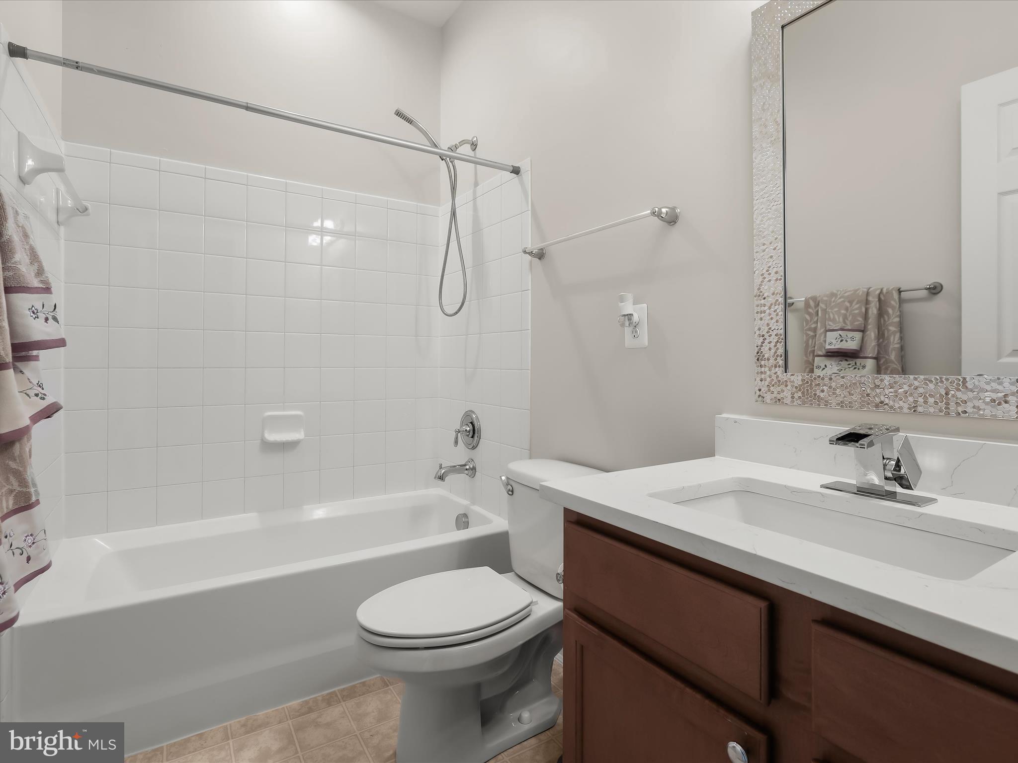 7222 Abbey Road Elkridge, MD 21075 - Photo 21 of 35 Hall bathroom with new quartz vanity top & faucet
