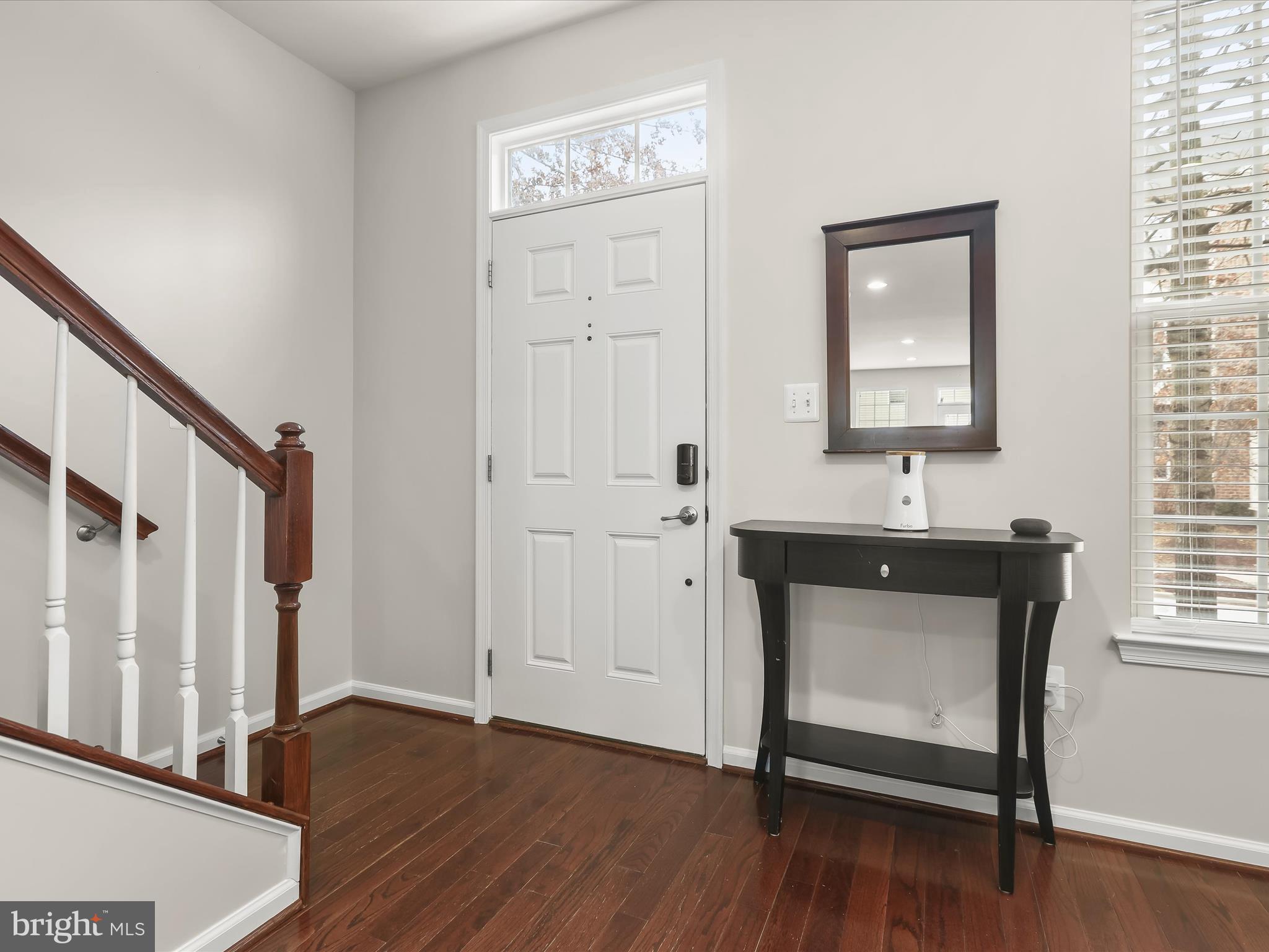 7222 Abbey Road Elkridge, MD 21075 - Photo 7 of 35 Foyer with hardwood flooring