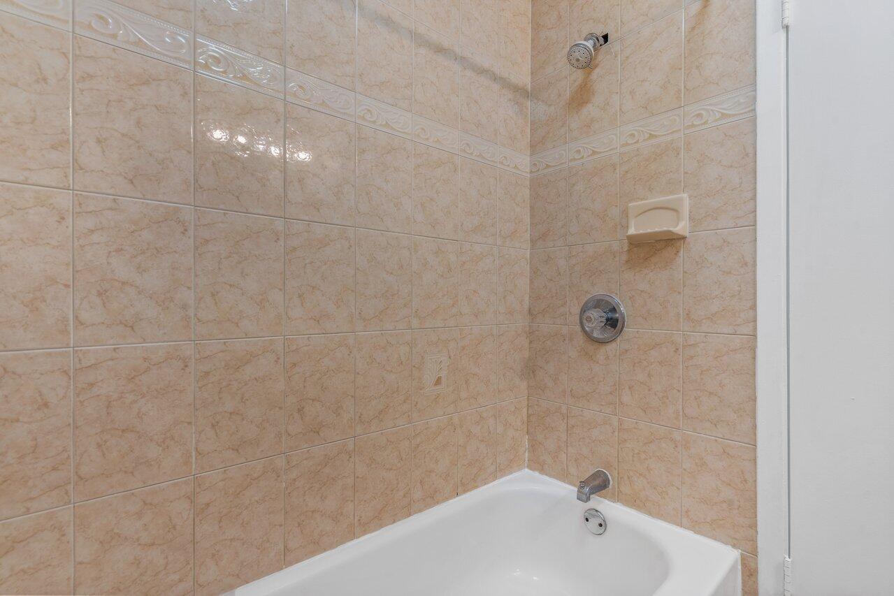 1089 Northwest 13th Street, Unit 4 Boca Raton, FL 33486 - Photo 11 of 27 Bathroom 1 (downstairs)