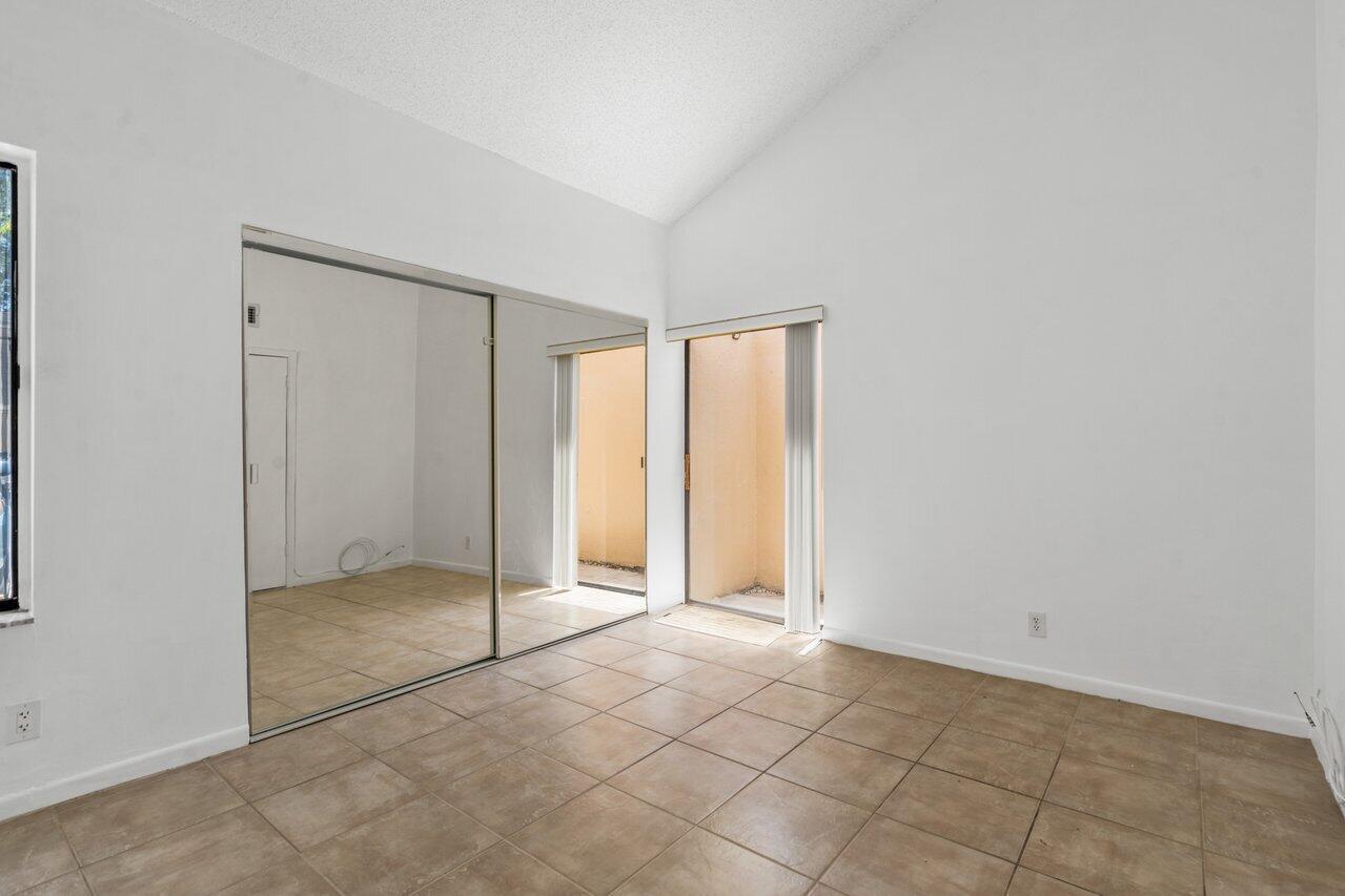 1089 Northwest 13th Street, Unit 4 Boca Raton, FL 33486 - Photo 8 of 27 Bedroom 1 (downstairs)