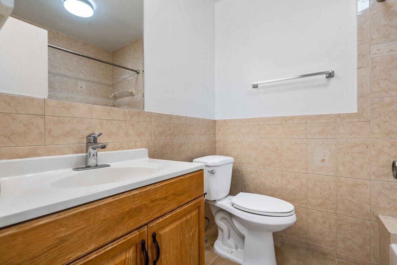 1089 Northwest 13th Street, Unit 4 Boca Raton, FL 33486 - Photo 10 of 27 Bathroom 1 (downstairs)