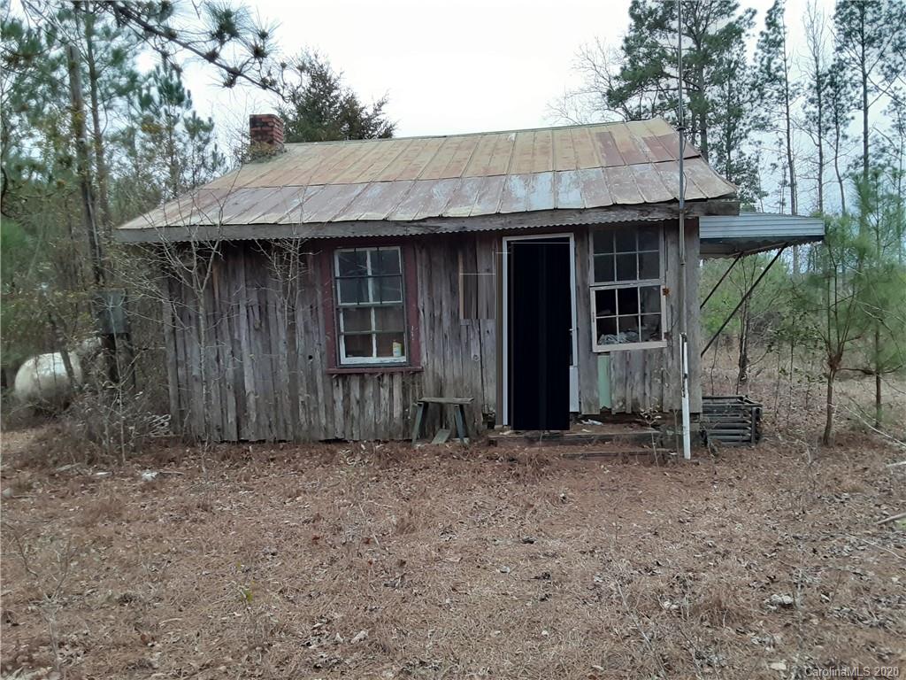 0 Lovin Road Rockingham, NC 28379 - Photo 4 of 6 a front view of a house with a yard