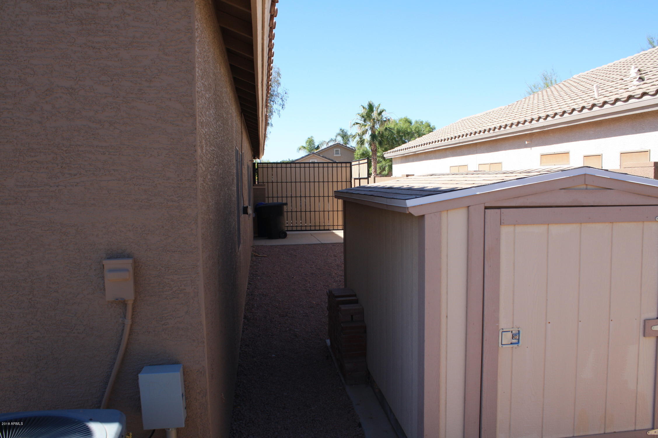 11816 West Windsor Avenue Avondale, AZ 85392 - Photo 17 of 19 a bathroom with a sink and mirror