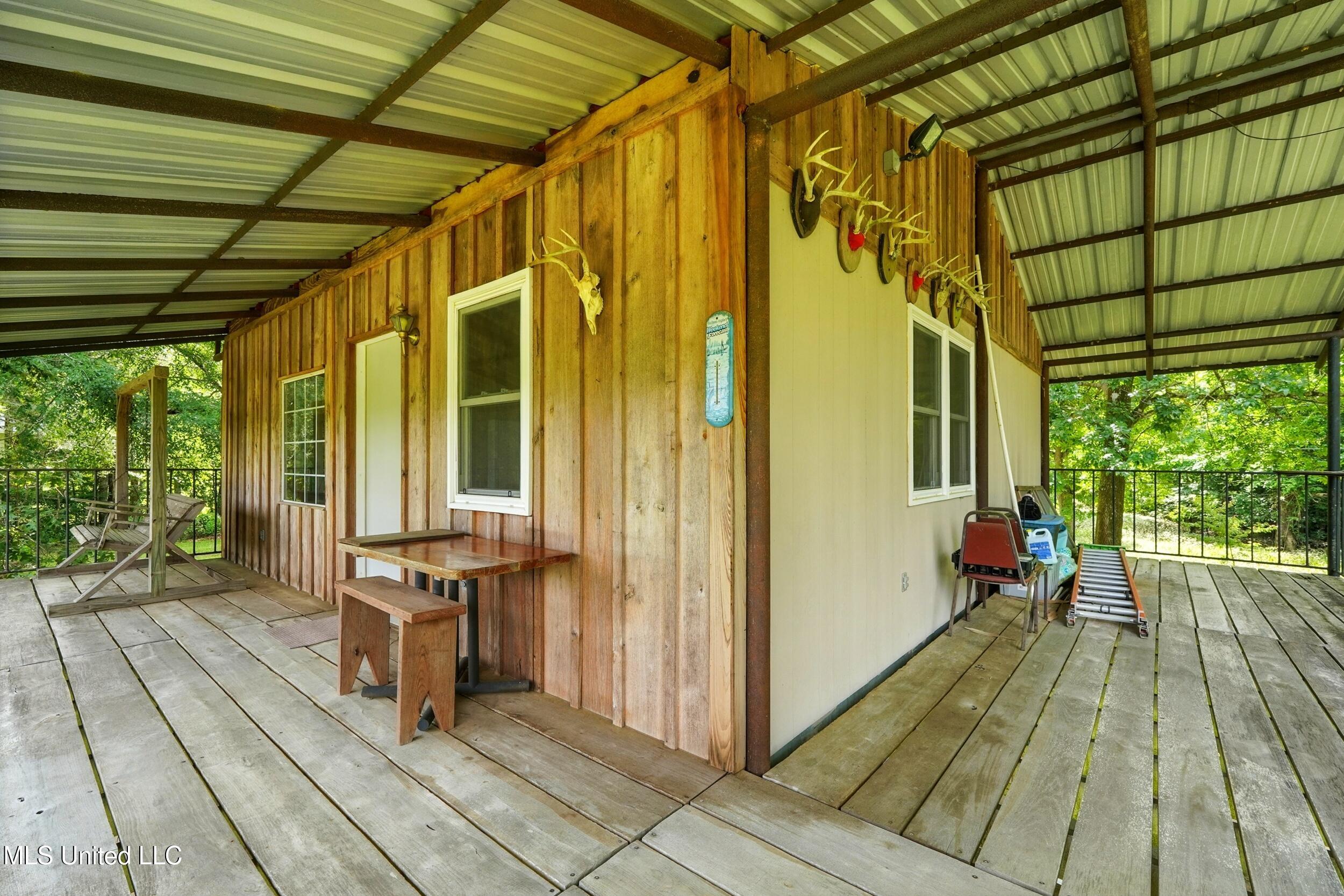 151 Wheatfield Road Poplarville, MS 39470 - Photo 22 of 26 22_porch 3