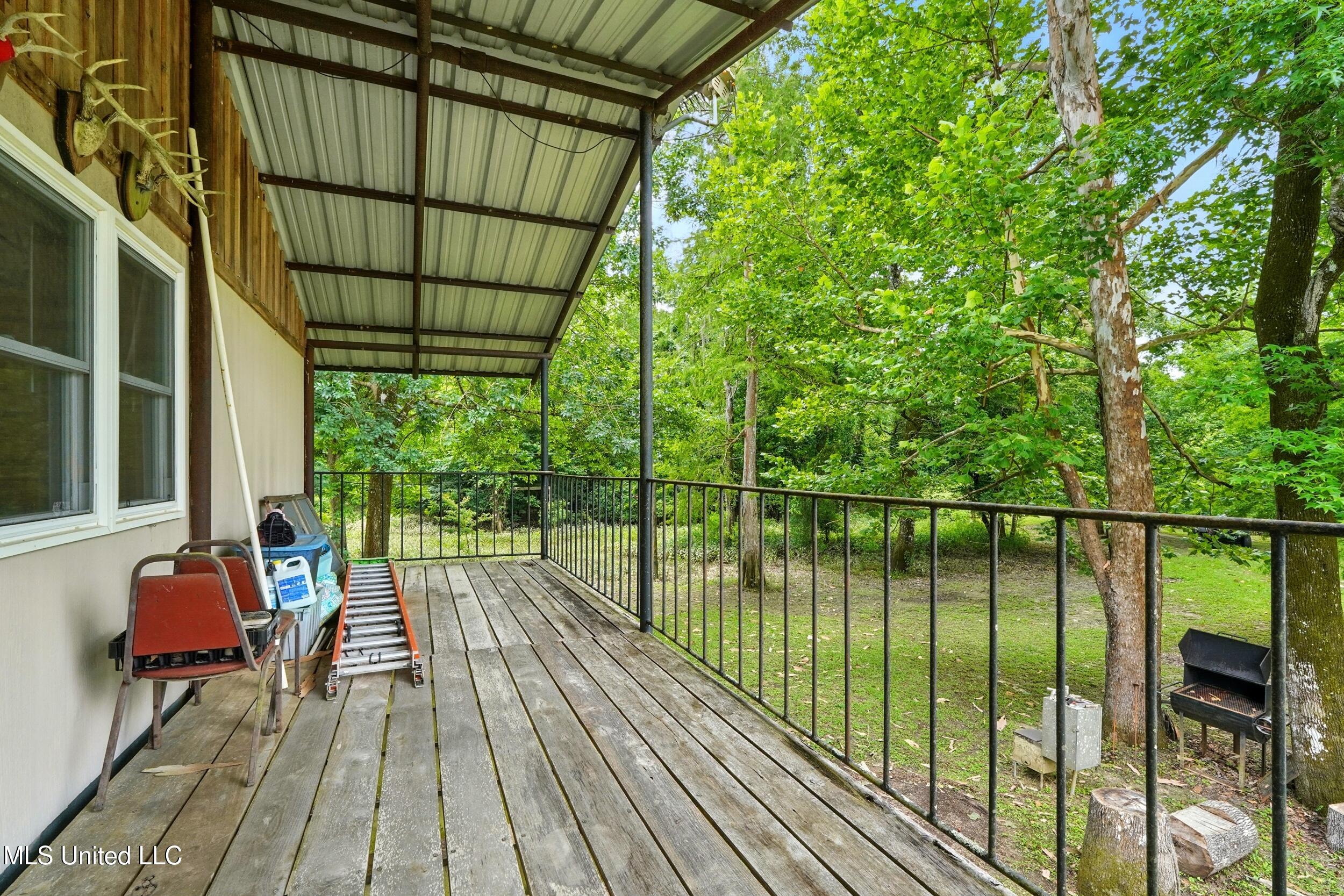 151 Wheatfield Road Poplarville, MS 39470 - Photo 23 of 26 23_porch 1