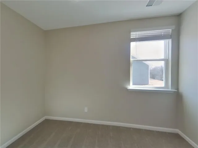 a bathroom with a sink double vanity and a mirror