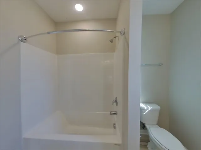 a view of a room that has a window