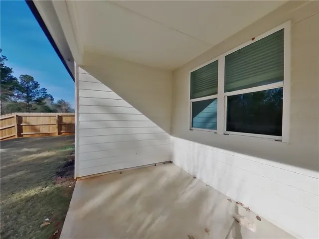 a picture of a bathroom with a shower