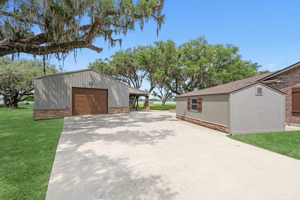 814 Sunset Trail Angleton, TX 77515 - Photo 27 of 33 Barn and well house