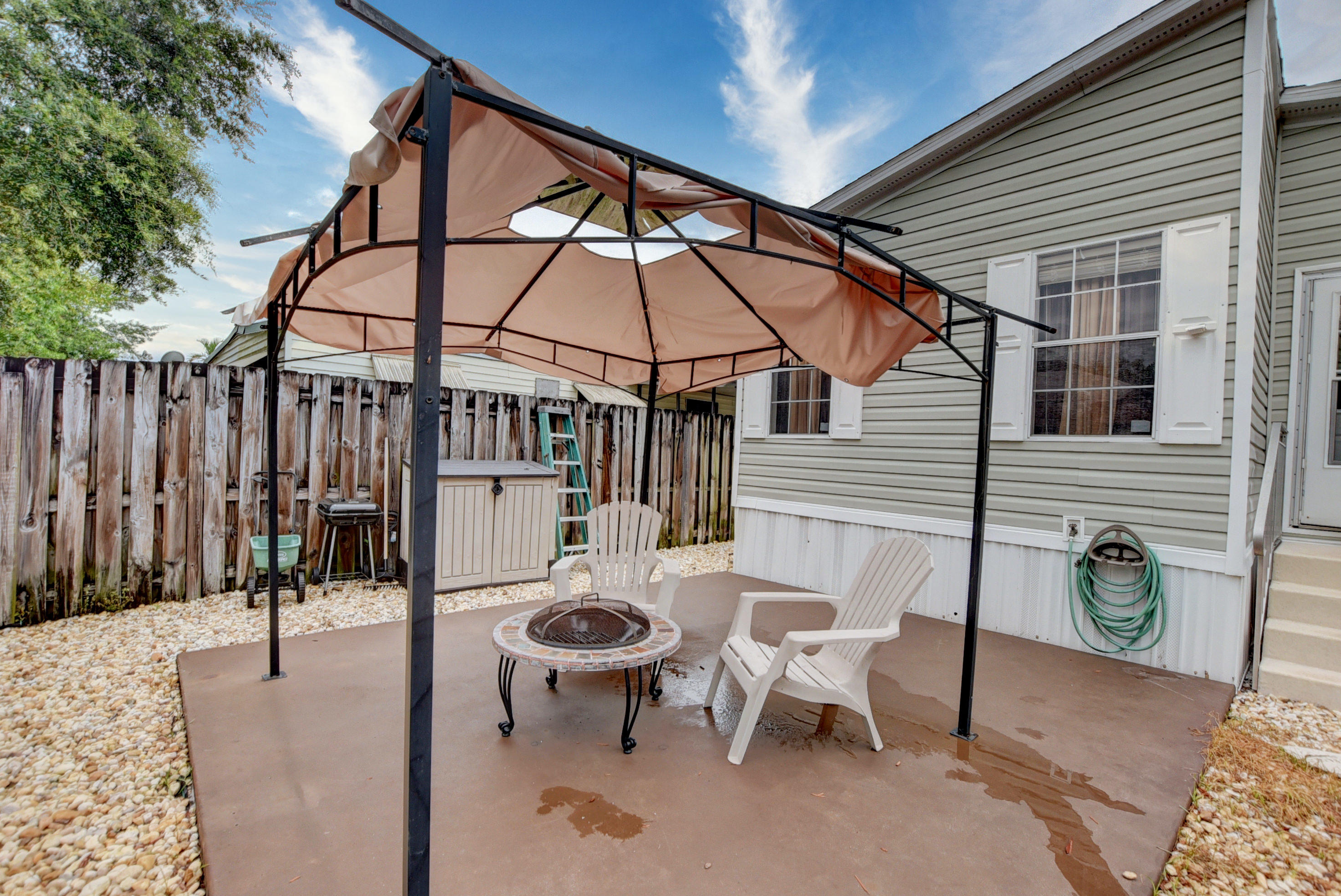 10442 Marina Way Boca Raton, FL 33428 - Photo 29 of 30 covered patio with fire pit
