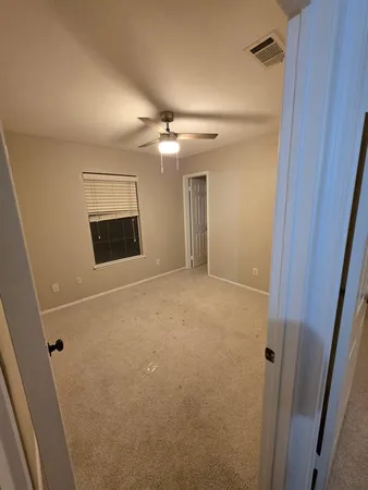a bathroom with a double vanity sink and mirror