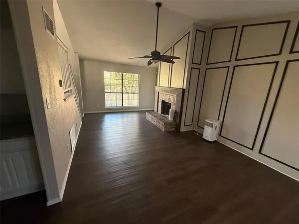 a view of entryway with wooden floor