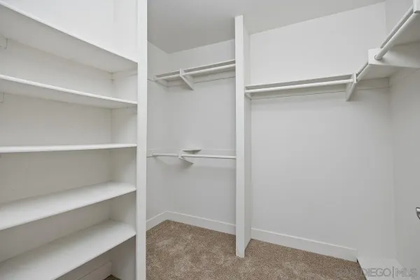 a view of an empty walk in closet