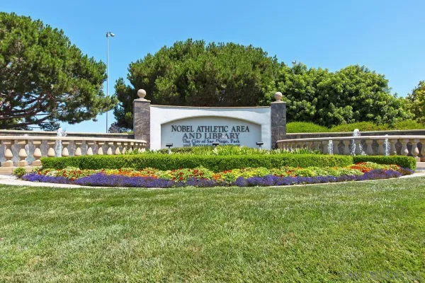 a view of a house with a park
