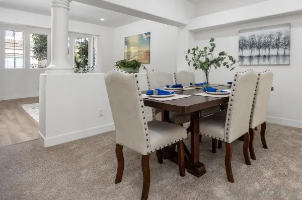 a view of a dining room with furniture