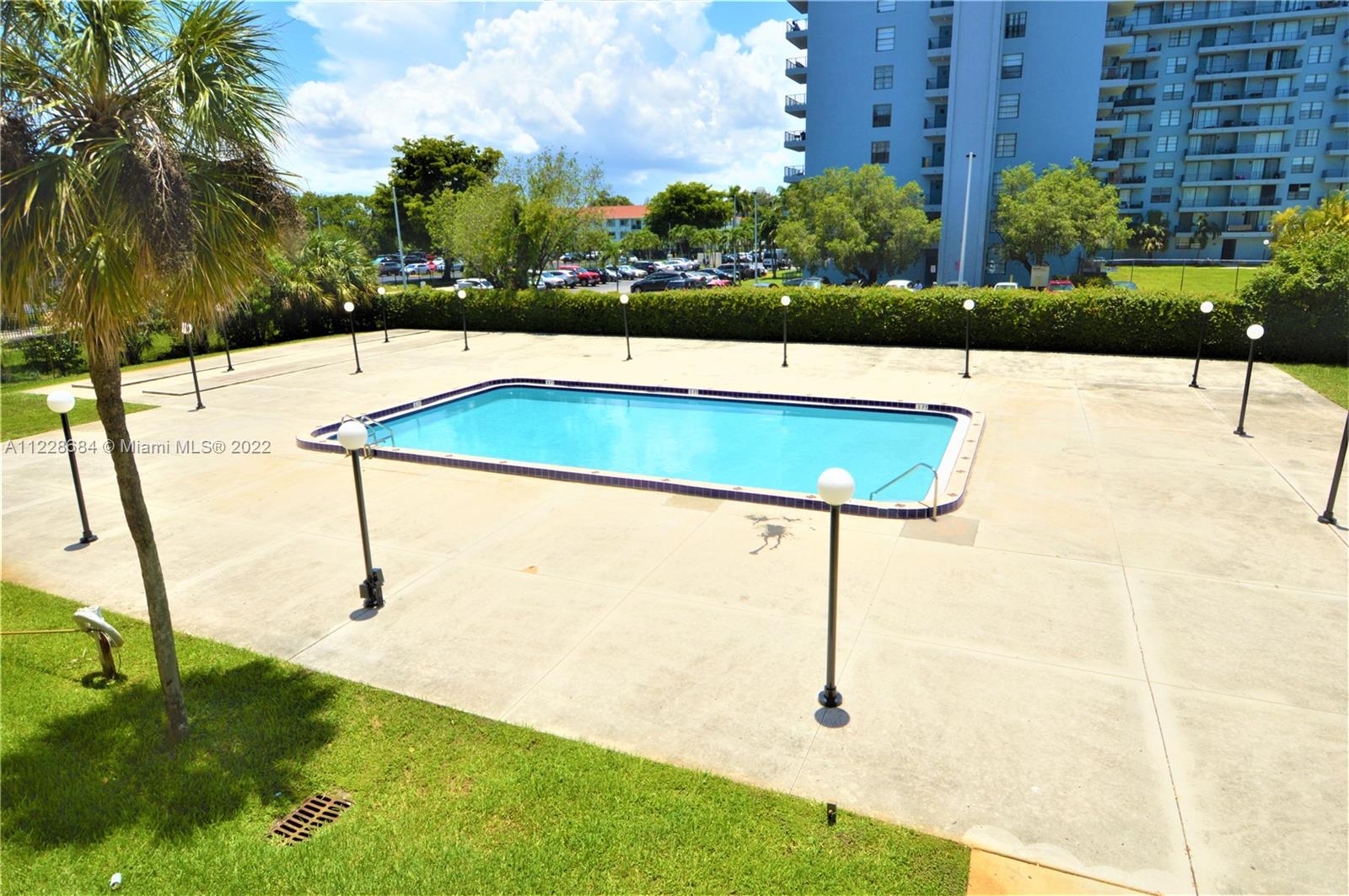 Golden Glades Miami, FL 33169 - Photo 15 of 17 a view of outdoor space and swimming pool