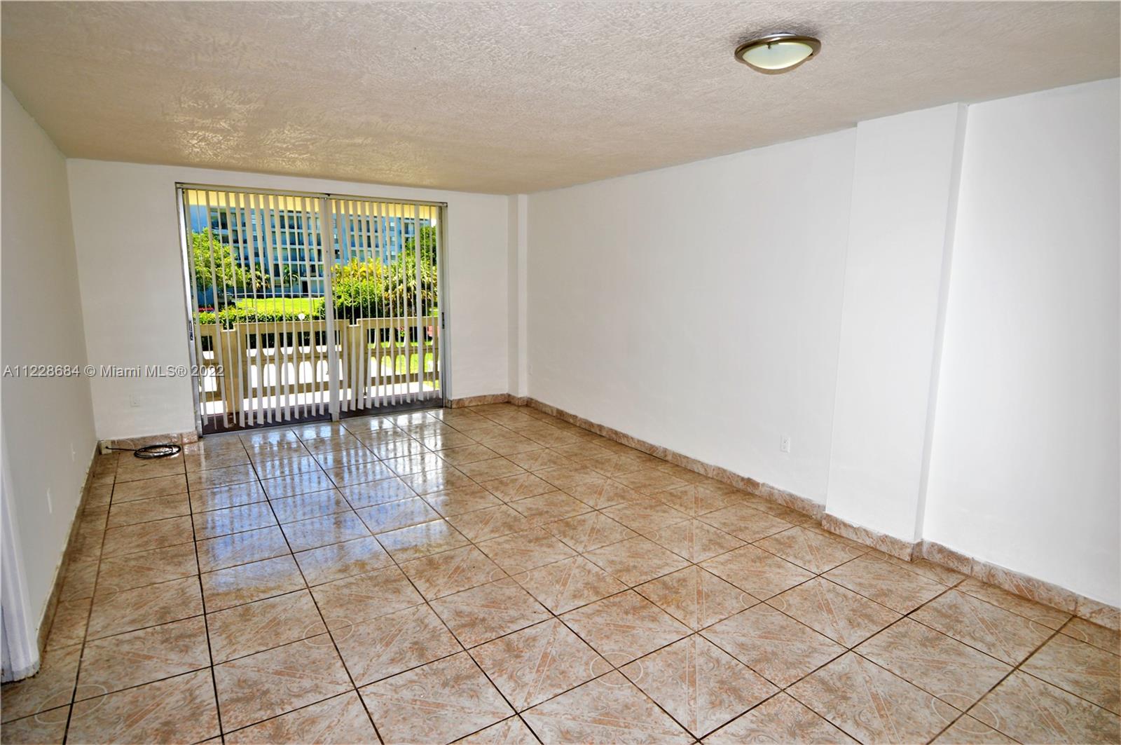 Golden Glades Miami, FL 33169 - Photo 4 of 17 a view of an empty room and window