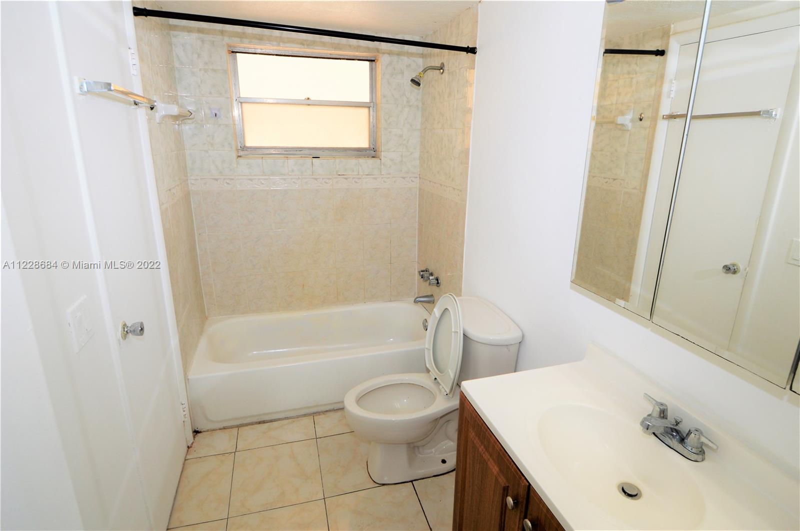 Golden Glades Miami, FL 33169 - Photo 9 of 17 a bathroom with a sink toilet and shower