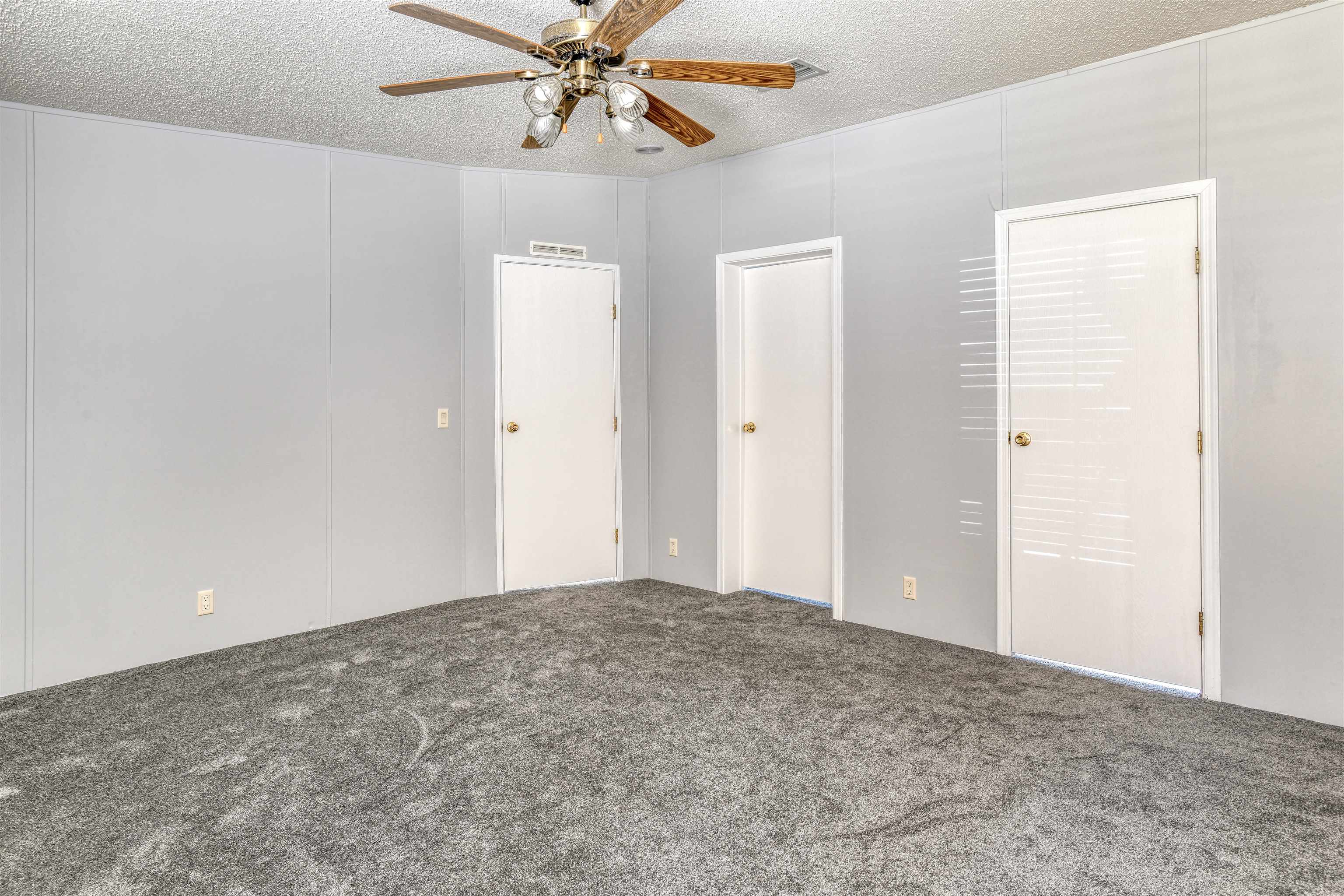 3170 Usina Road St. Augustine, FL 32084 - Photo 13 of 33 an empty room with chandelier fan