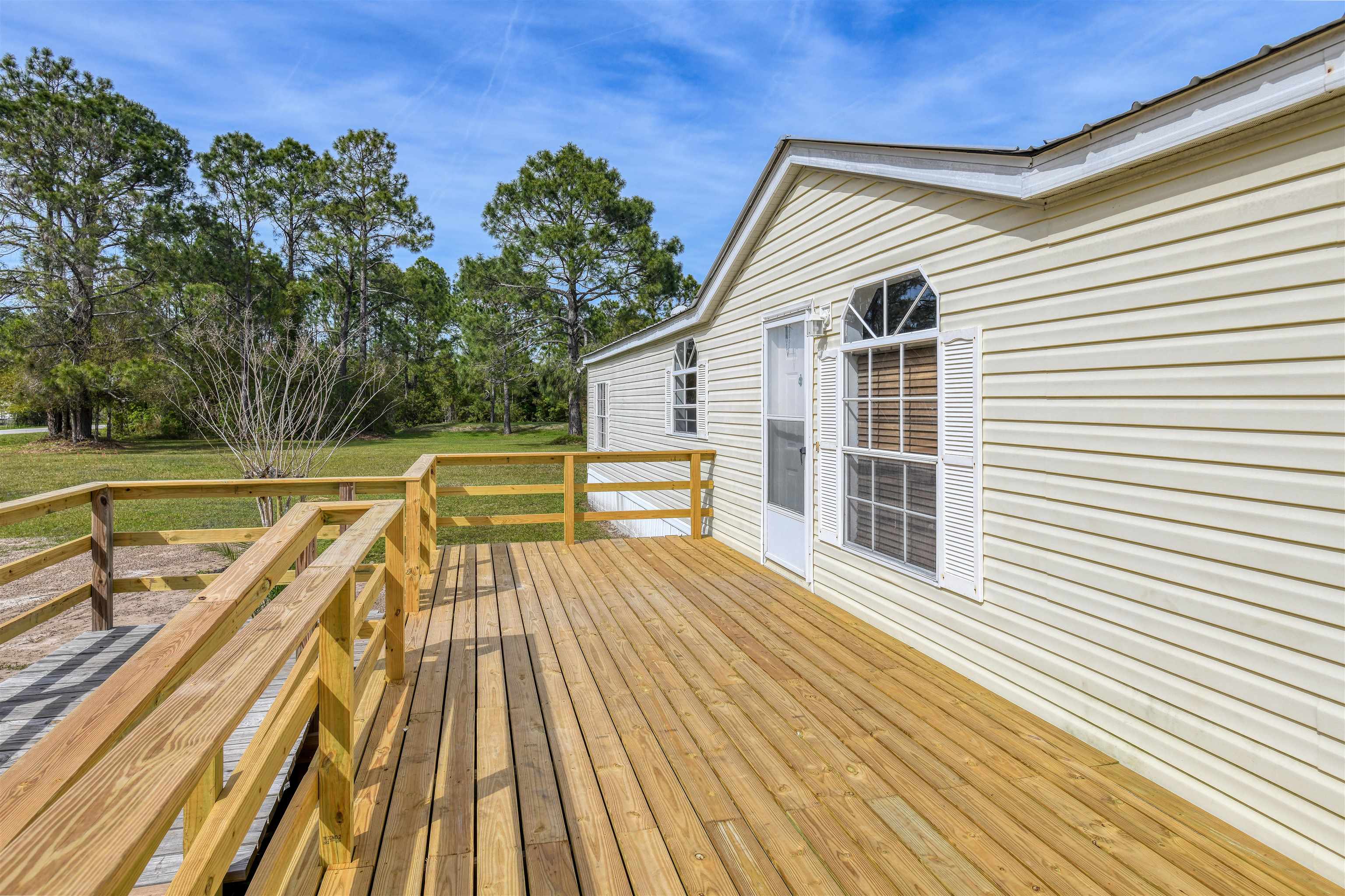 3170 Usina Road St. Augustine, FL 32084 - Photo 33 of 33 a view of a house with a deck