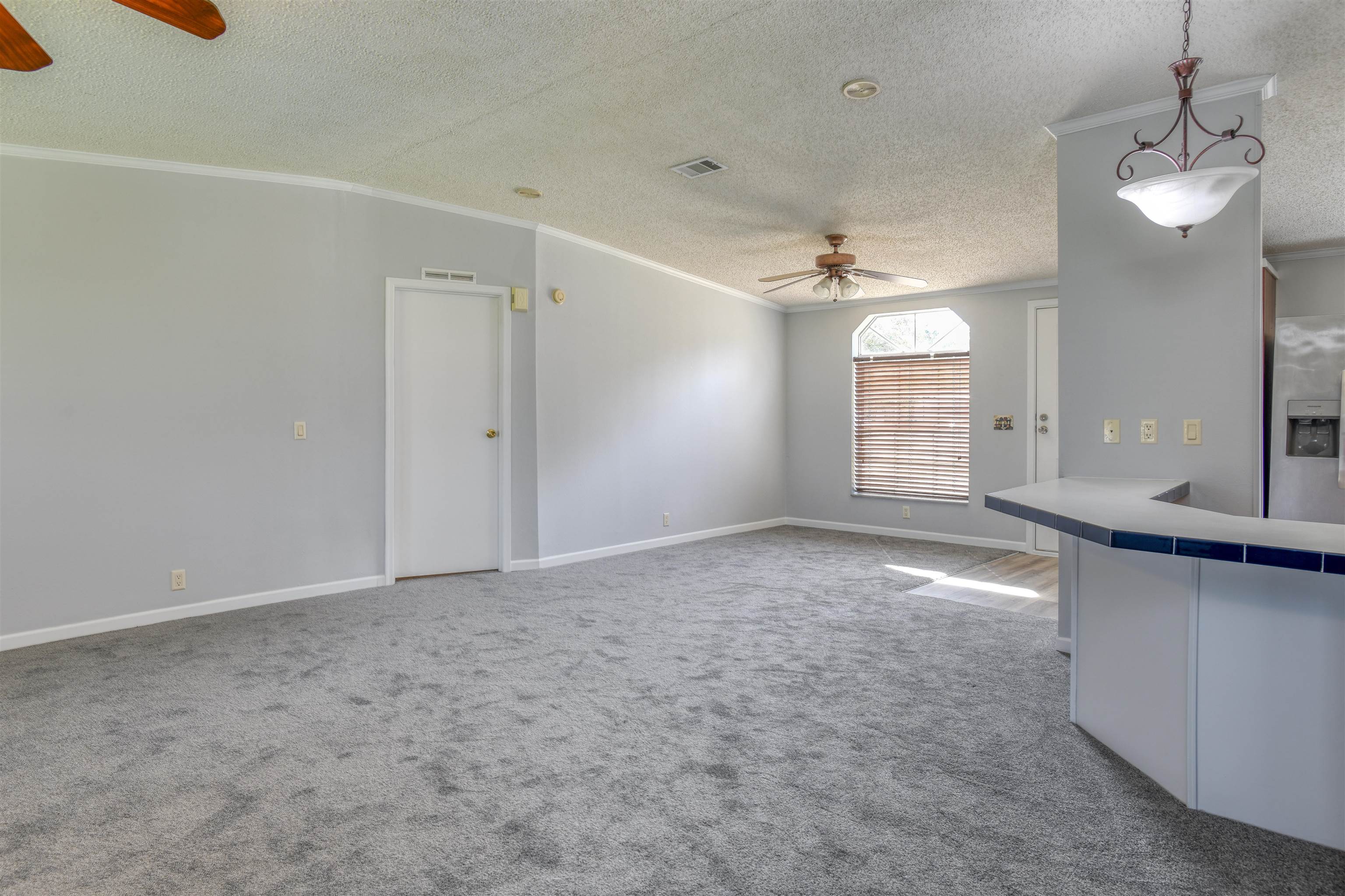 3170 Usina Road St. Augustine, FL 32084 - Photo 5 of 33 a view of an empty room with a window