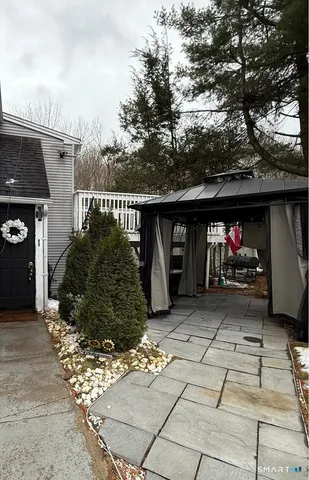 a view of porch with seating space