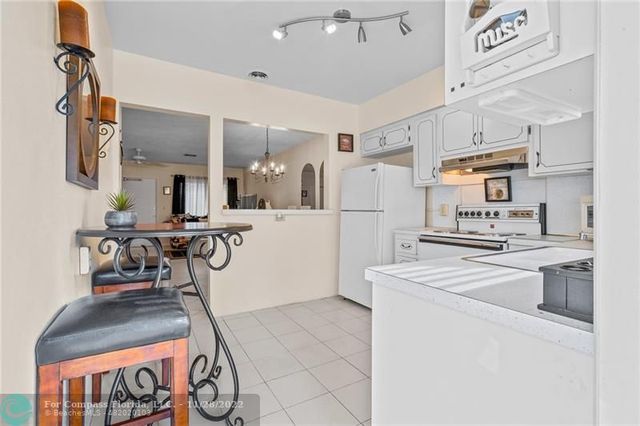 a view of a pathway with a park