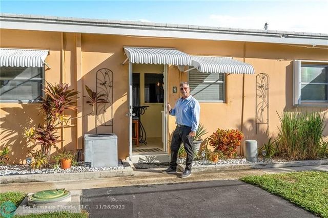 a view of a backyard of a house