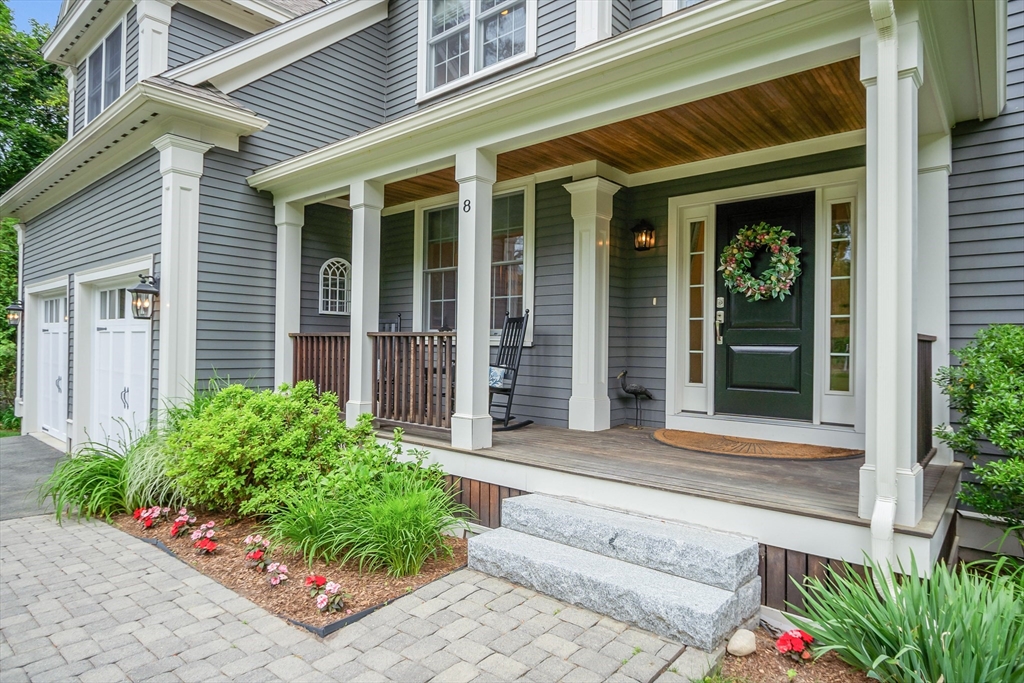 8 Holton Road Lexington, MA 02421 - Photo 2 of 42 a front view of a house with garden