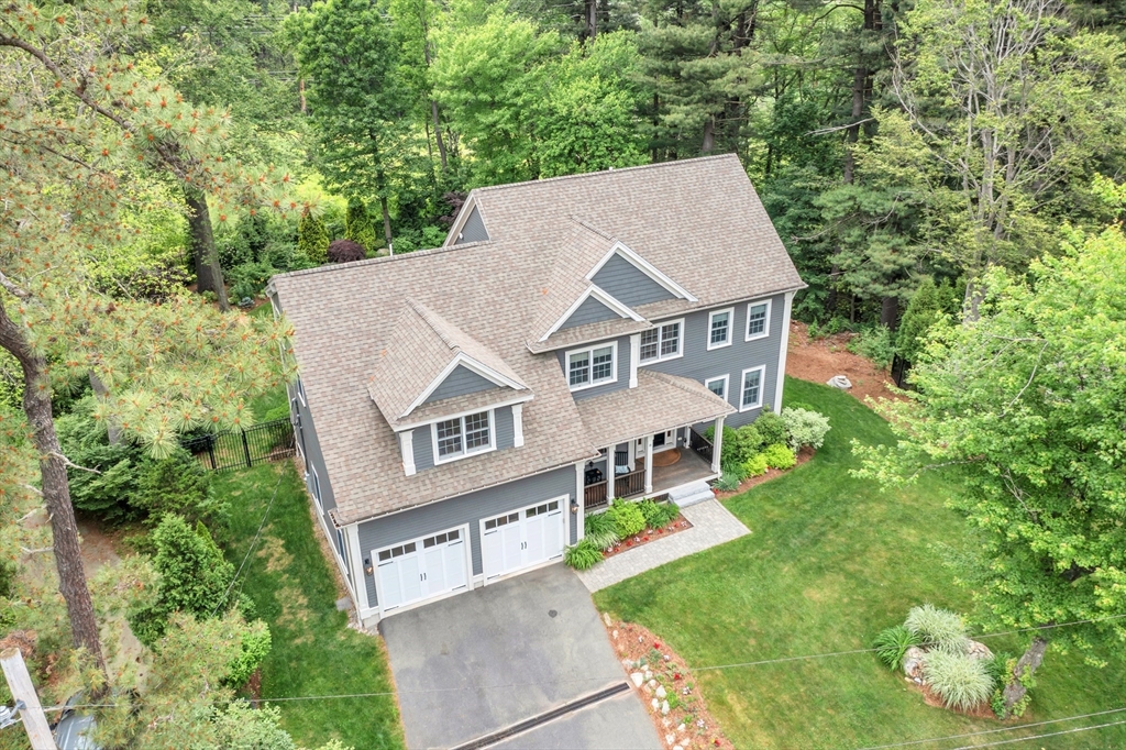 8 Holton Road Lexington, MA 02421 - Photo 42 of 42 an aerial view of a house with a yard