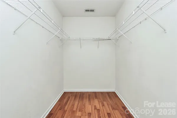 a view of a room with racks on the wall