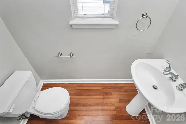 a bathroom with a toilet and a sink
