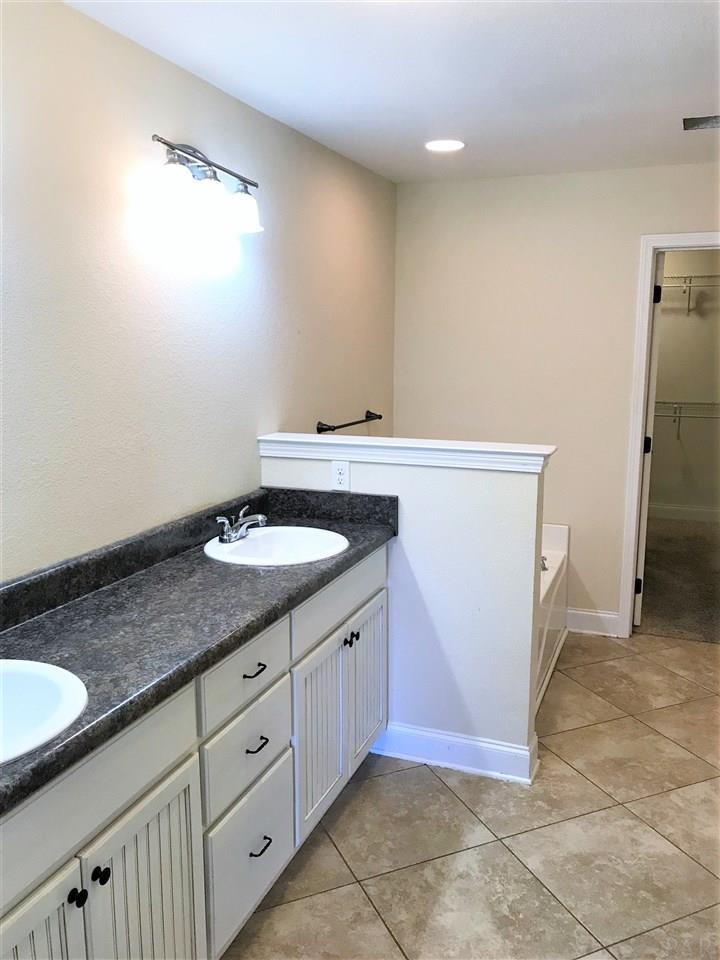 3839 Adams Road Pace, FL 32571 - Photo 12 of 27 Dual sink vanity in master bathroom.